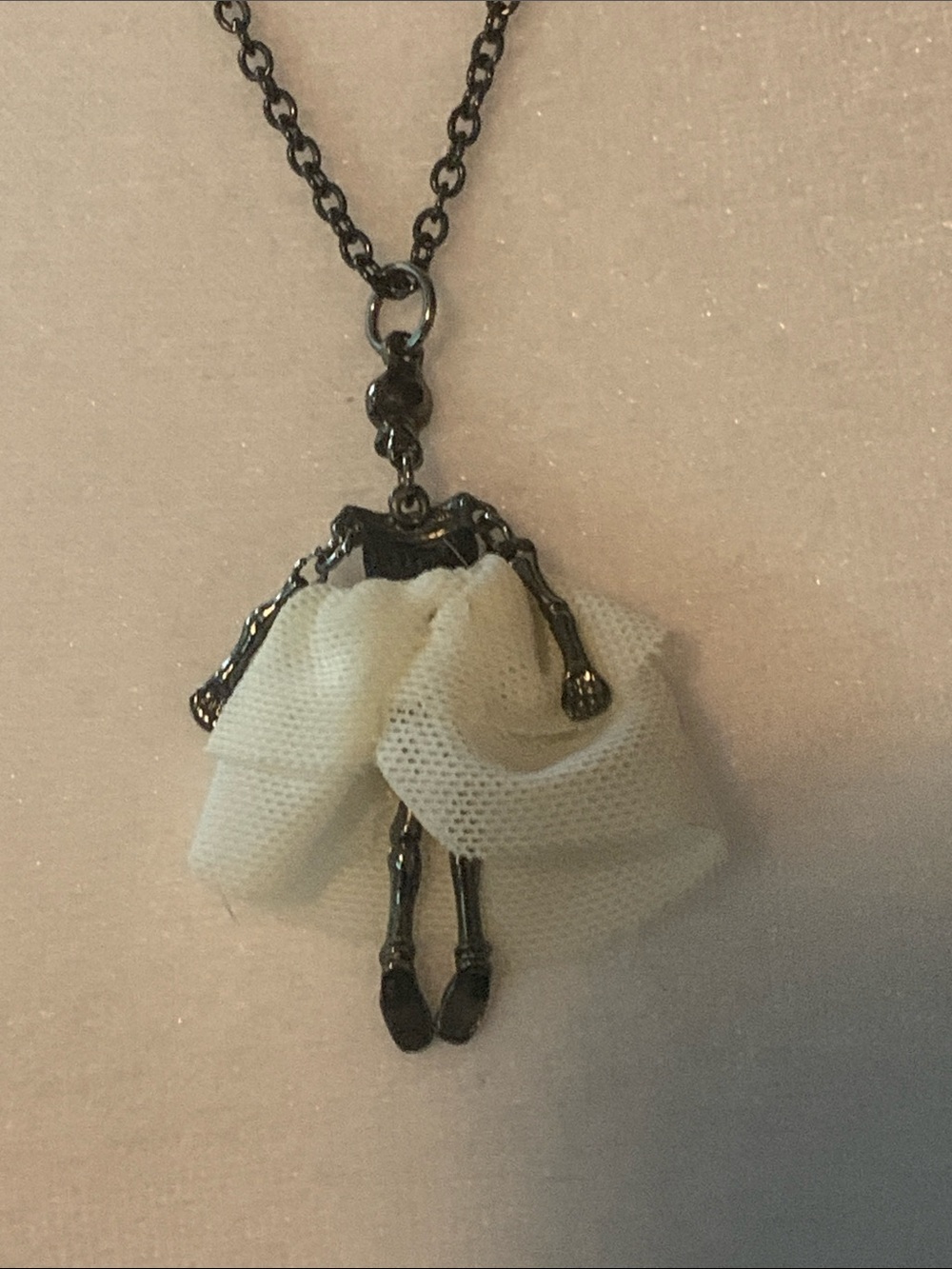 Whimsical Skeleton Doll Pendant Necklace with Cream Fabric Skirt